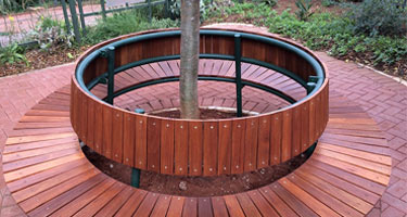 This is a photo of a custom wooden 
                                bench made for the Botanic Gardens, Durban